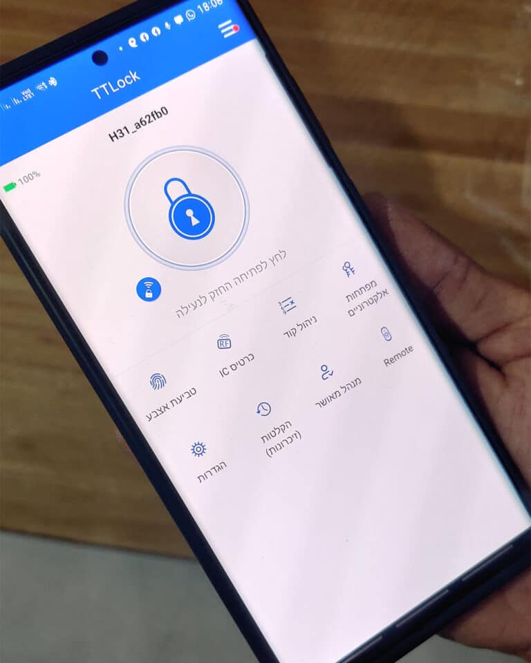 application Elock Wize smart lock israel. Smartphone in human hand
